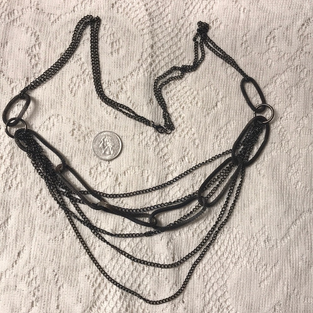 Multi strand black swanky necklace